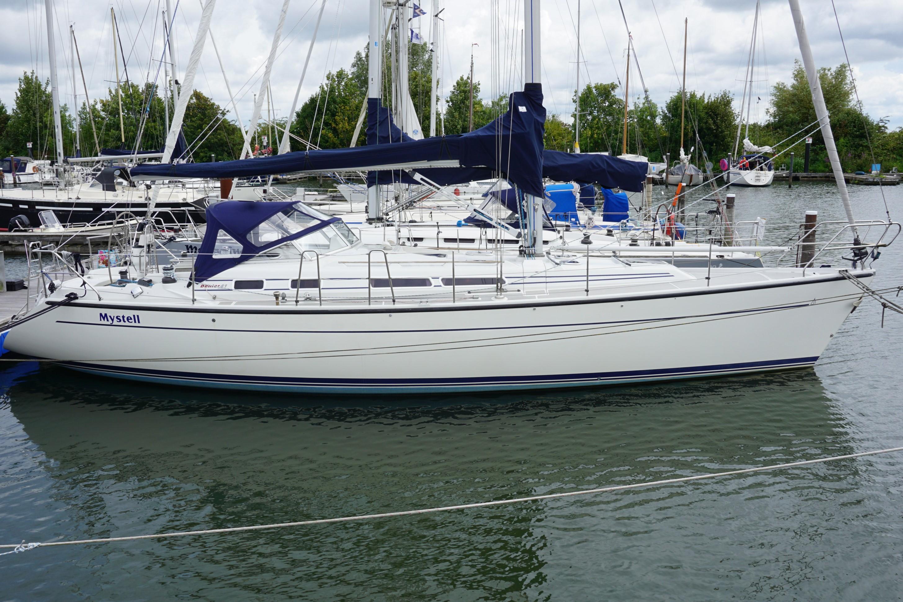 Dehler 41 CR 1997 Dehler 41 CR sailboat docked in a marina, side view.