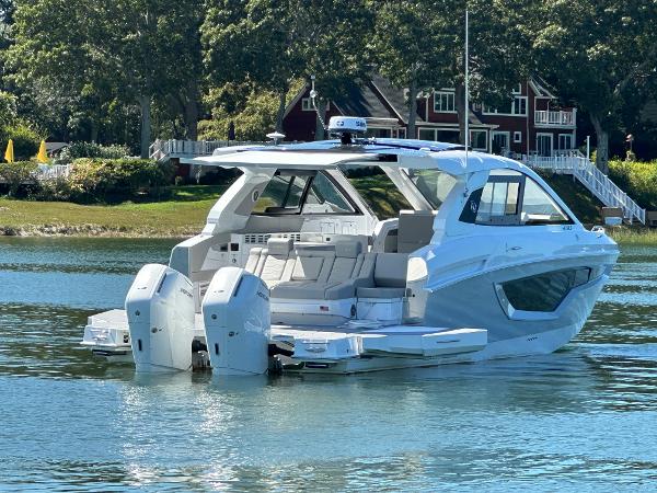 Cruisers Yachts 42 GLS Outboard 2024 Cruisers Yachts 42 GLS Outboard on a serene lake.