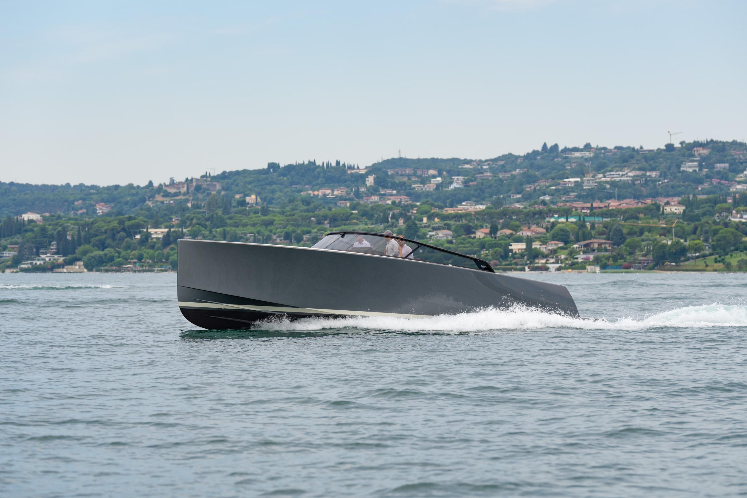 VanDutch VanDutch 40 2025 VanDutch 40 yacht cruising on a scenic lake with lush hills in the background.