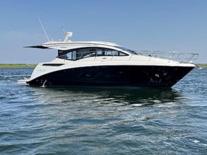 Sea Ray 400 Sundancer 2015 Sea Ray 400 Sundancer yacht cruising on calm waters under clear skies.