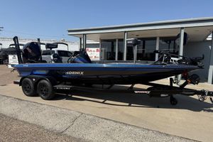 Phoenix 920 Elite X 2026 Phoenix 920 Elite X boat on trailer, parked outside dealership.