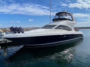 Sea Ray 420 Sedan Bridge 2005 Sea Ray 420 Sedan Bridge yacht docked on a sunny day.