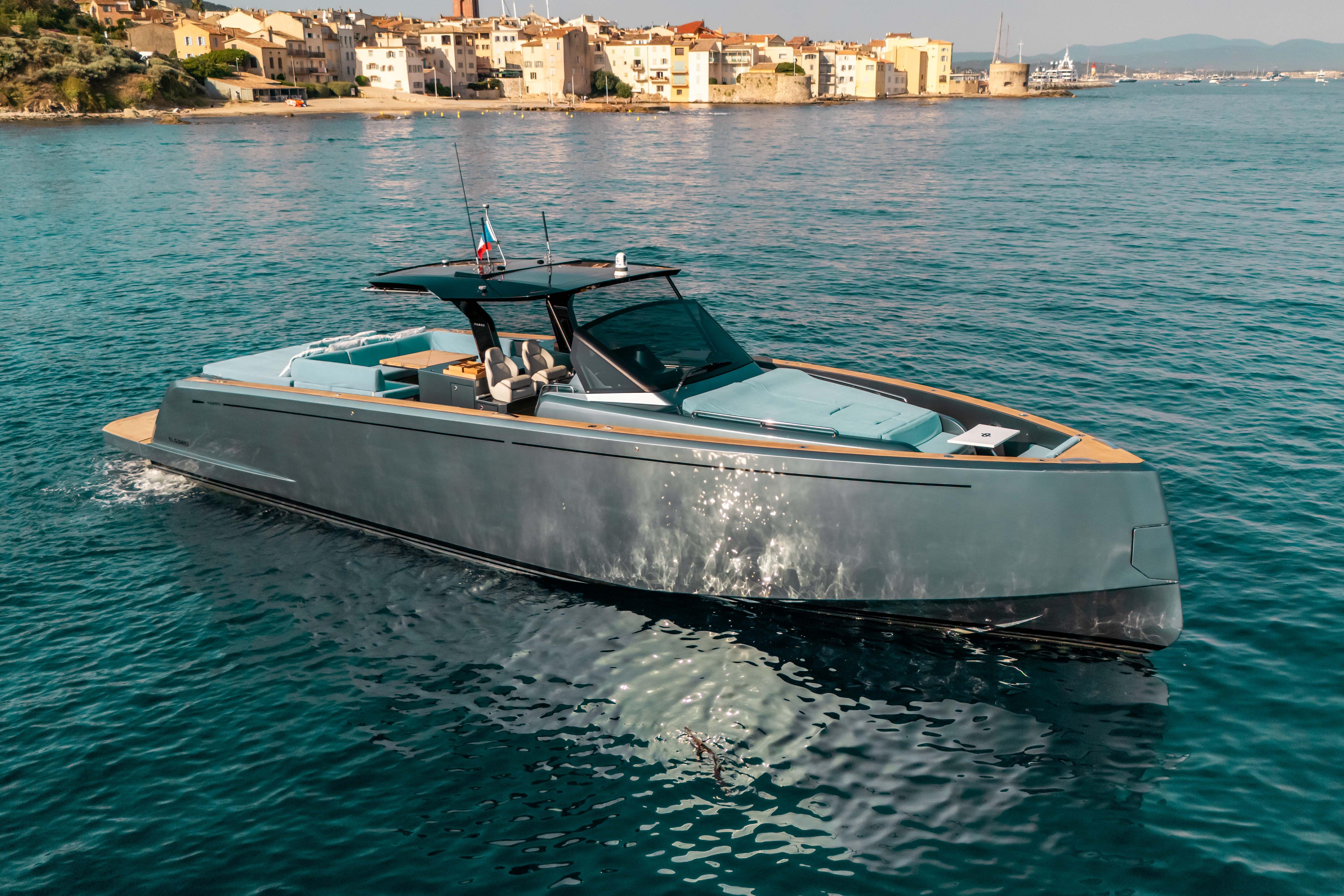Pardo Yachts 50 Luxury 2021 Pardo Yachts 50 cruising near a scenic coastal town.