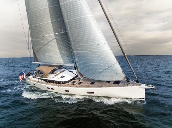 CNB 66 Sailing yacht CNB 66, 2021 model, cruising on open water with full sails.