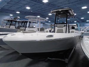 Caymas 281 HB 2025 Caymas 281 HB boat displayed in a showroom, featuring sleek design and modern amenities.