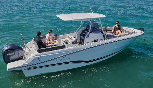 Jeanneau Leader 7.5CC S3-77963 2023 Jeanneau Leader 7.5CC S3 boat cruising with passengers on a sunny day.