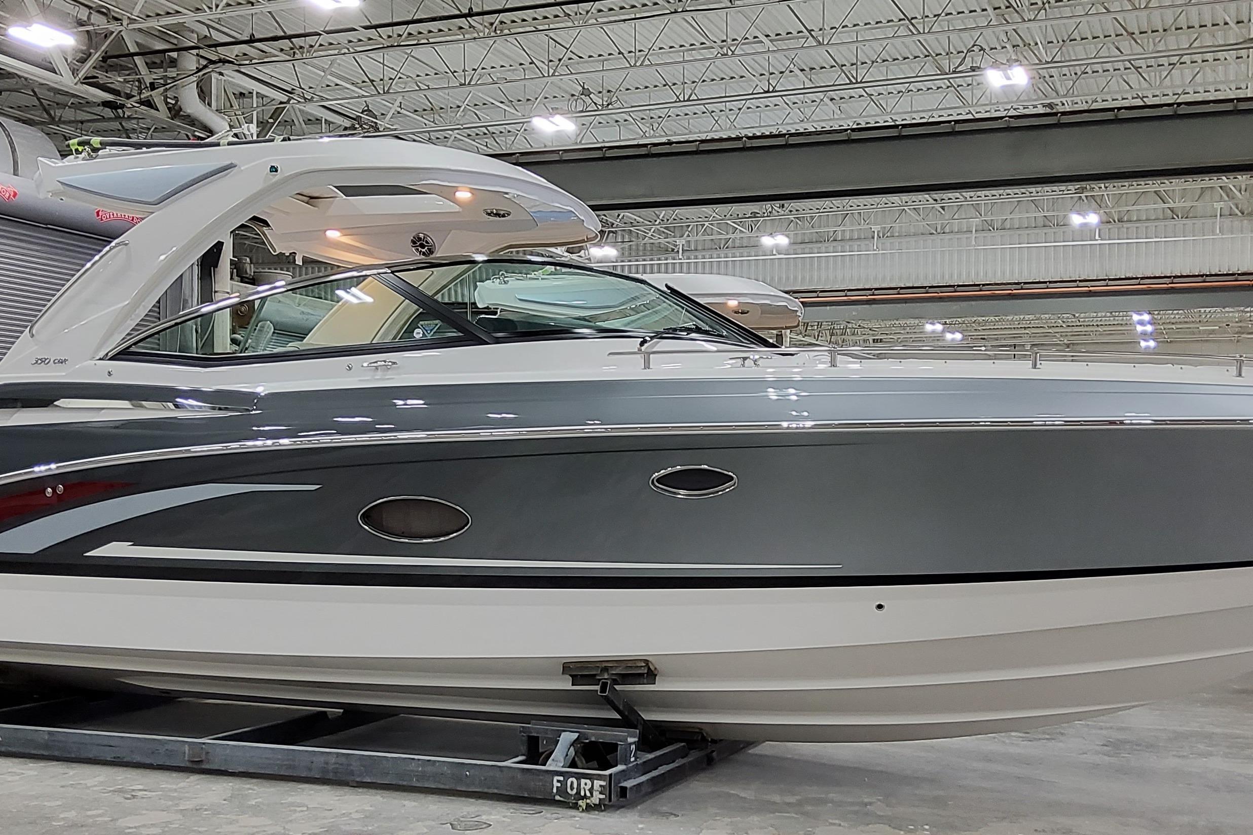 Formula 350 Crossover Bowrider OB 2024 Formula 350 Crossover Bowrider OB in a showroom, showcasing sleek design and modern features.