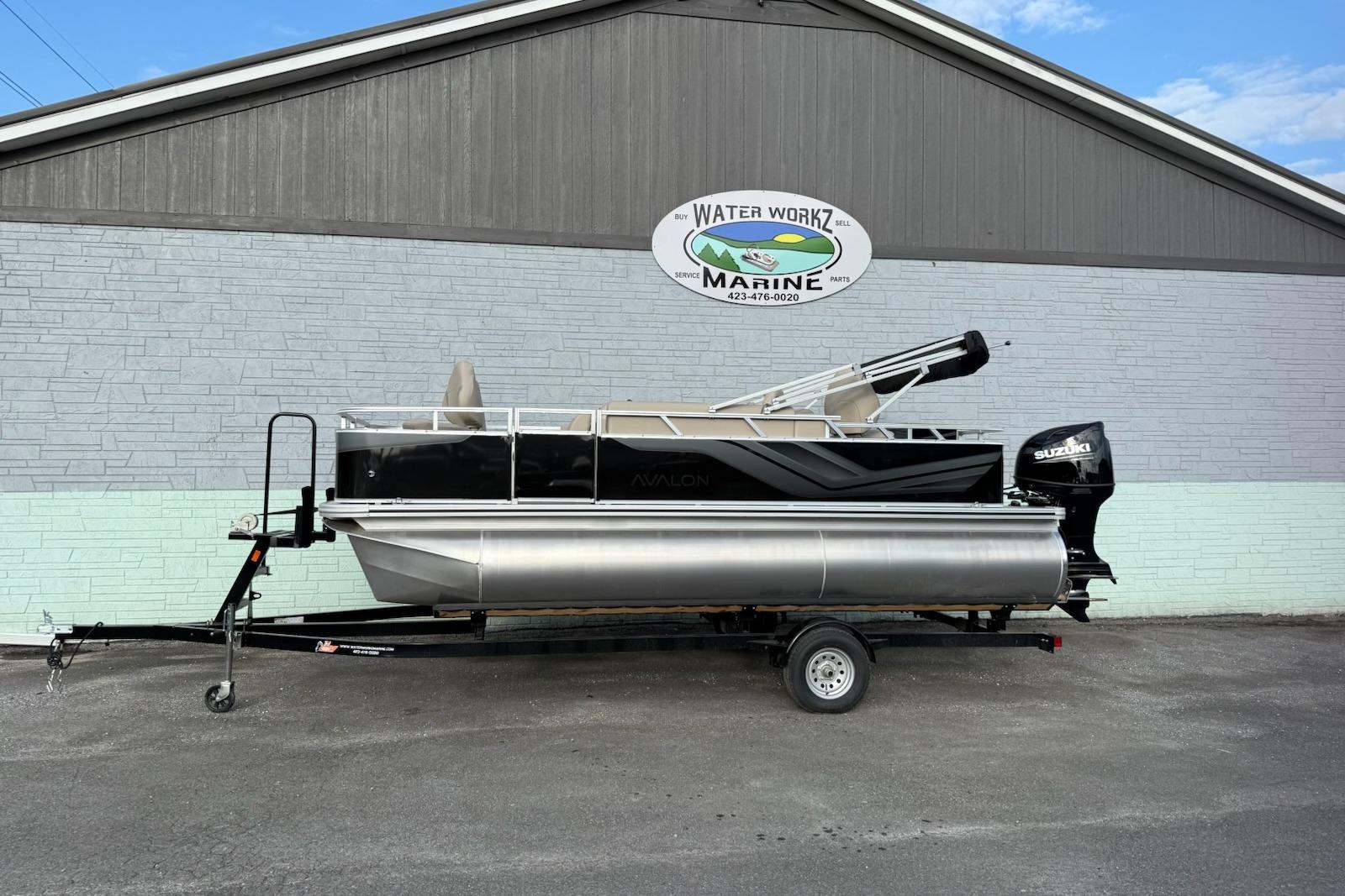 Avalon VTX Quad Fish 2025 Avalon VTX Quad Fish pontoon boat on trailer at Water Workz Marine.