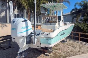 NauticStar 251 Hybrid 2020 NauticStar 251 Hybrid boat with Yamaha 300 engine, parked outdoors.