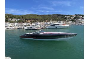 Formula 353 FASTech 2013 Formula 353 FASTech boat cruising in a scenic marina with hillside backdrop.