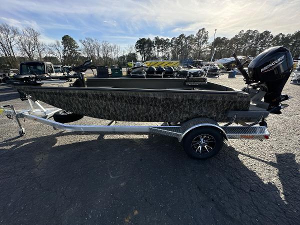 Thor Lake Hammer Elite 2023 Thor Lake Hammer Elite boat on trailer with Mercury outboard motor.