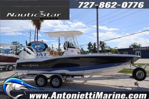 NauticStar 231 Hybrid 2025 NauticStar 231 Hybrid boat on trailer at Antonietti Marine dealership.