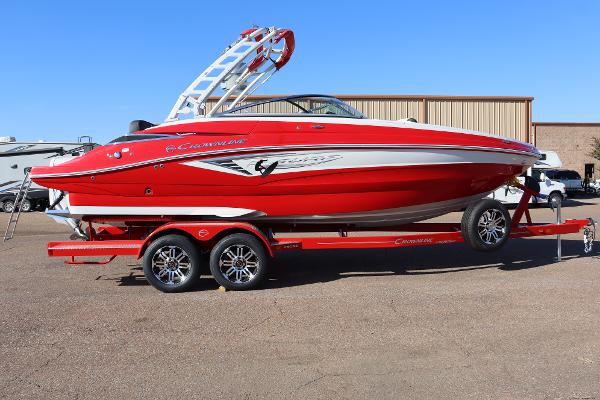Crownline 260SS SURF 2024 Crownline 260SS SURF boat on a red trailer.