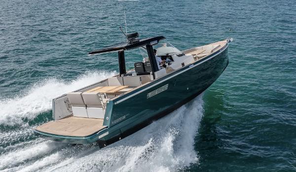 Fjord 38 2023 Fjord 38 boat cruising on open water, showcasing sleek design and powerful performance.