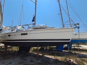 Hunter 410 Sailboat on land, Hunter 410 model, year 2000, with masts and rigging visible.