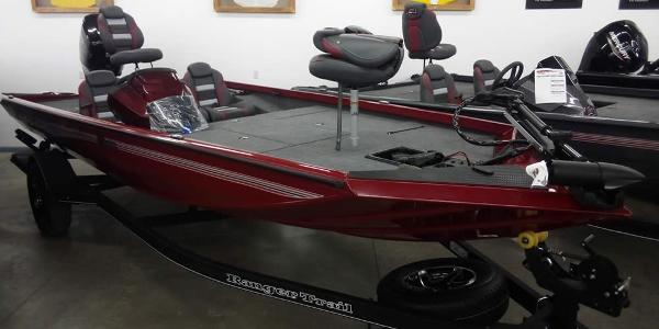 Ranger RT188C 2025 Ranger RT188C fishing boat in showroom, featuring sleek red design and modern seating.