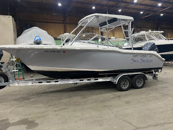 Key West 239 DFS 2021 Key West 239 DFS boat on trailer in indoor storage facility.