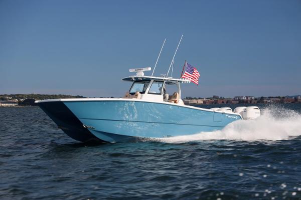 Freeman 38 2026 Freeman 38 boat cruising on water with American flag.
