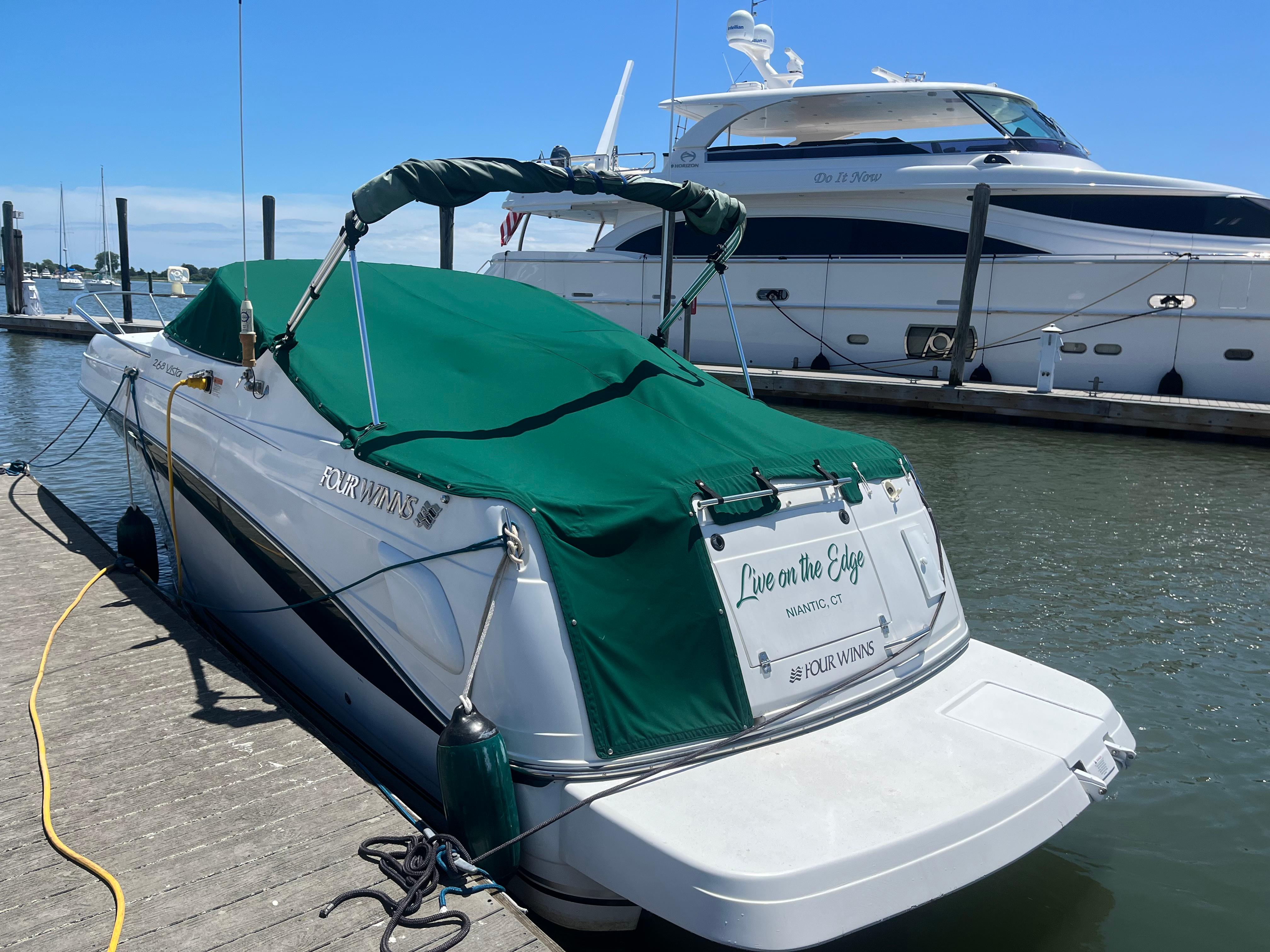Four Winns 268 Vista 2000 Four Winns 268 Vista boat docked with green cover, Niantic, CT.