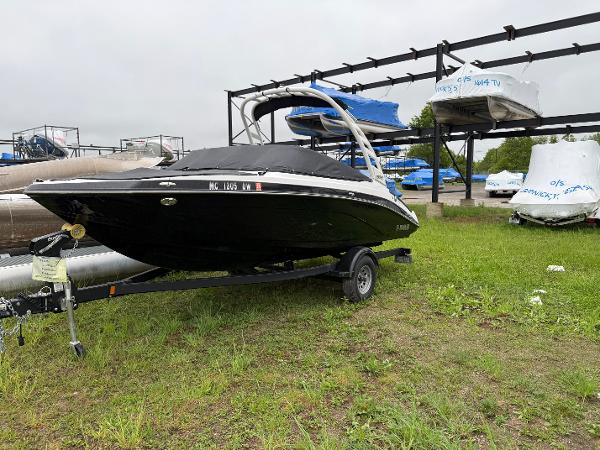 Yamaha Boats 195S 2023 Yamaha Boats 195S on trailer in outdoor storage area.