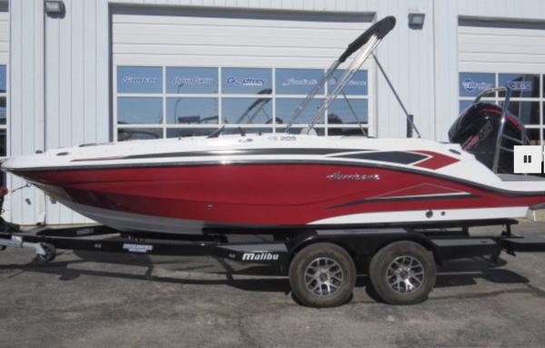 Hurricane SunDeck Sport 205 OB 2023 Hurricane SunDeck Sport 205 OB boat on a trailer outside a dealership.