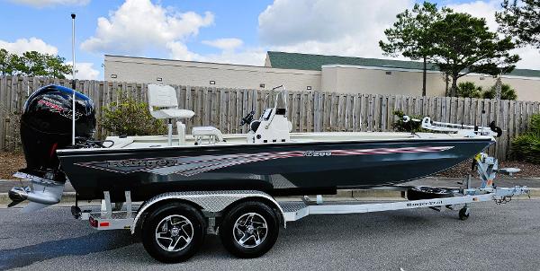Ranger RB200 2024 Ranger RB200 boat on trailer, parked outdoors, with clear sky background.