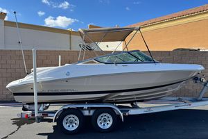 Regal 2000 ES 2016 Regal 2000 ES boat on trailer, parked outdoors under clear sky.