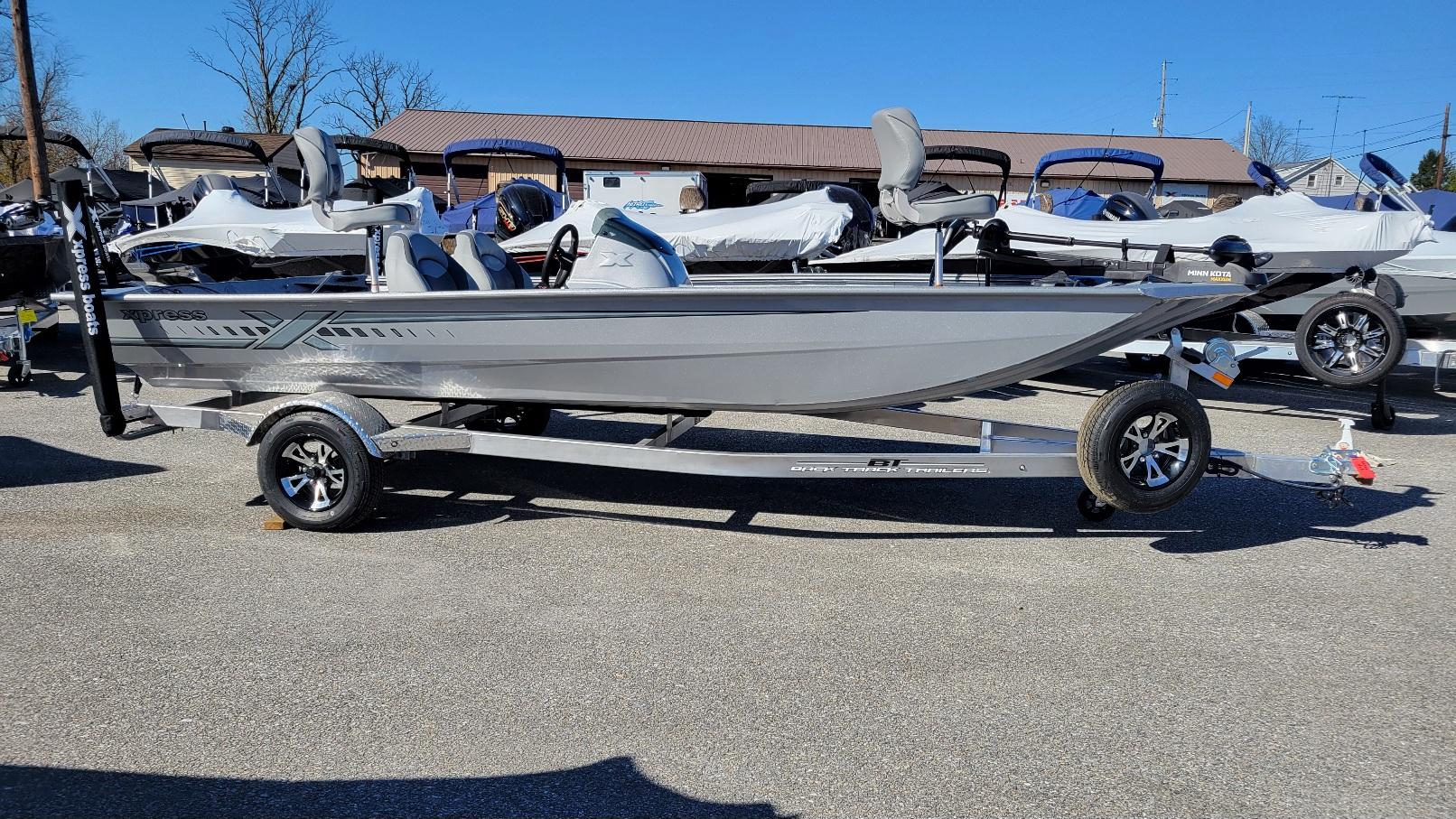 Xpress XP180 Bass. Yamaha F25 hp. (In stock!) 2025 Xpress XP180 Bass boat with Yamaha F25 hp engine on trailer.