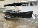 Vision Marine Technologies Quietude 156 2021 Vision Marine Technologies Quietude 156 boat on trailer, parked outdoors.
