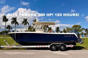 Sailfish 290 CC 2015 Sailfish 290 CC boat with 2019 Yamaha 300 HP engine, 180 hours, on trailer.