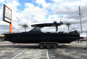 BRABUS Shadow 900 ST 2024 BRABUS Shadow 900 ST boat on trailer, parked outdoors under cloudy sky.