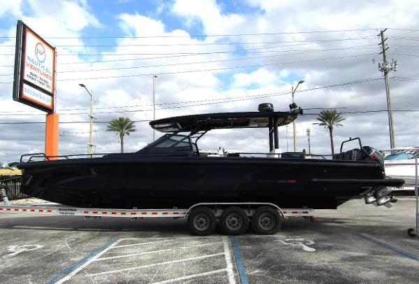 BRABUS Shadow 900 ST 2024 BRABUS Shadow 900 ST boat on trailer, parked outdoors under cloudy sky.