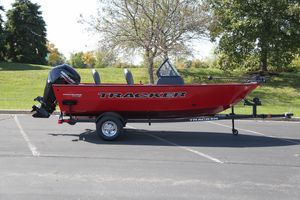 Tracker Pro Guide V-16 WT 2026 Tracker Pro Guide V-16 WT boat on trailer, parked outdoors.