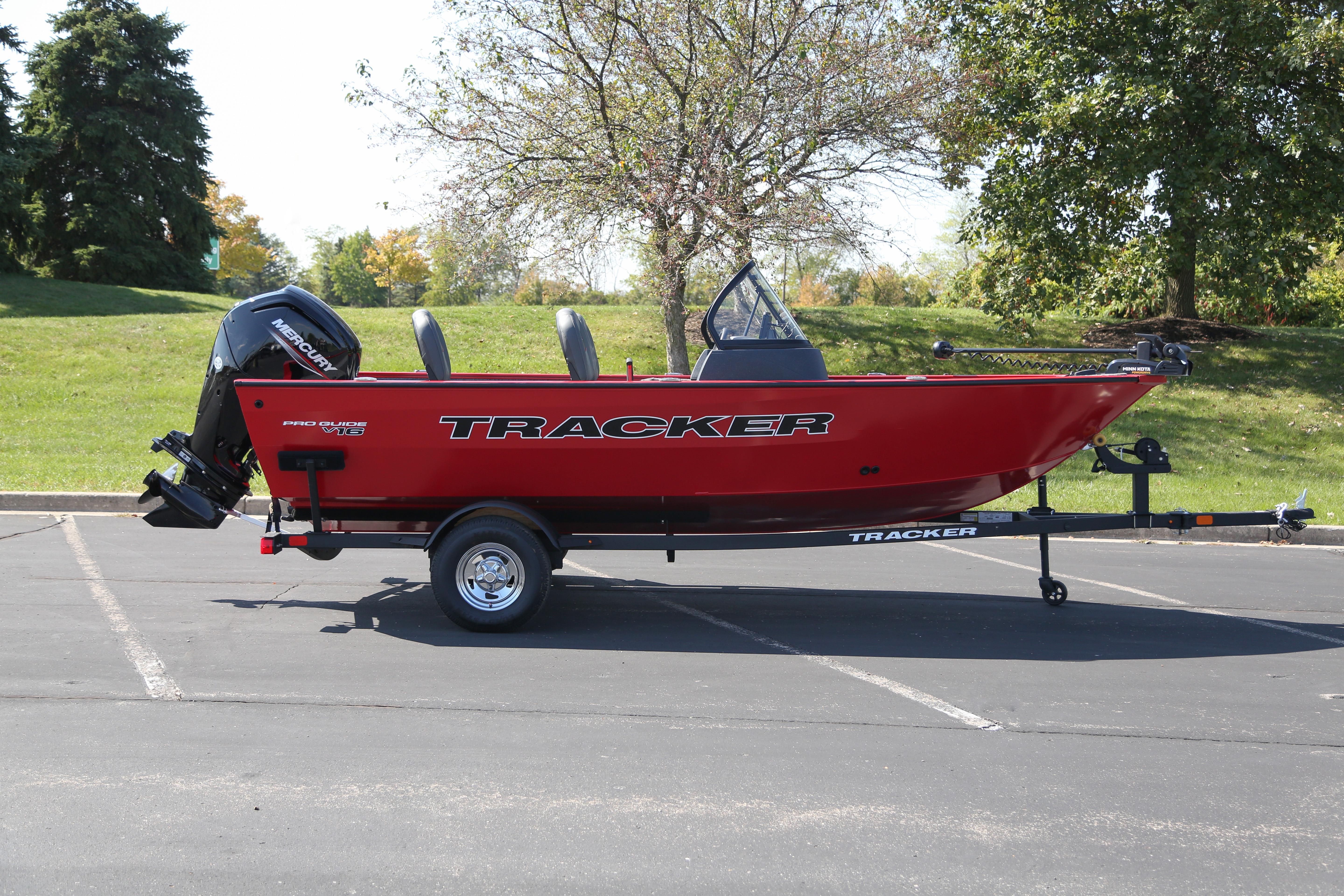 Tracker Pro Guide V-16 WT 2026 Tracker Pro Guide V-16 WT boat on trailer, parked outdoors.