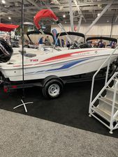 Tahoe T18 2023 Tahoe T18 boat displayed indoors with red and blue accents.