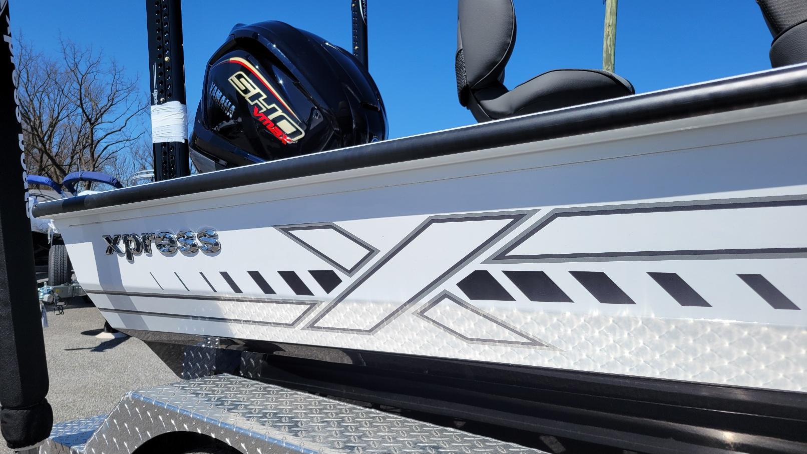Xpress X19 Pro Bass w/ Yamaha Vmax 200 SHO (On order) ETA August Xpress X19 Pro Bass boat with Yamaha 200 Vmax engine, side view, 2026 model.