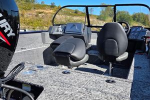 Tracker Pro Guide V-175 Combo 2026 Tracker Pro Guide V-175 Combo boat interior with seating and dashboard.