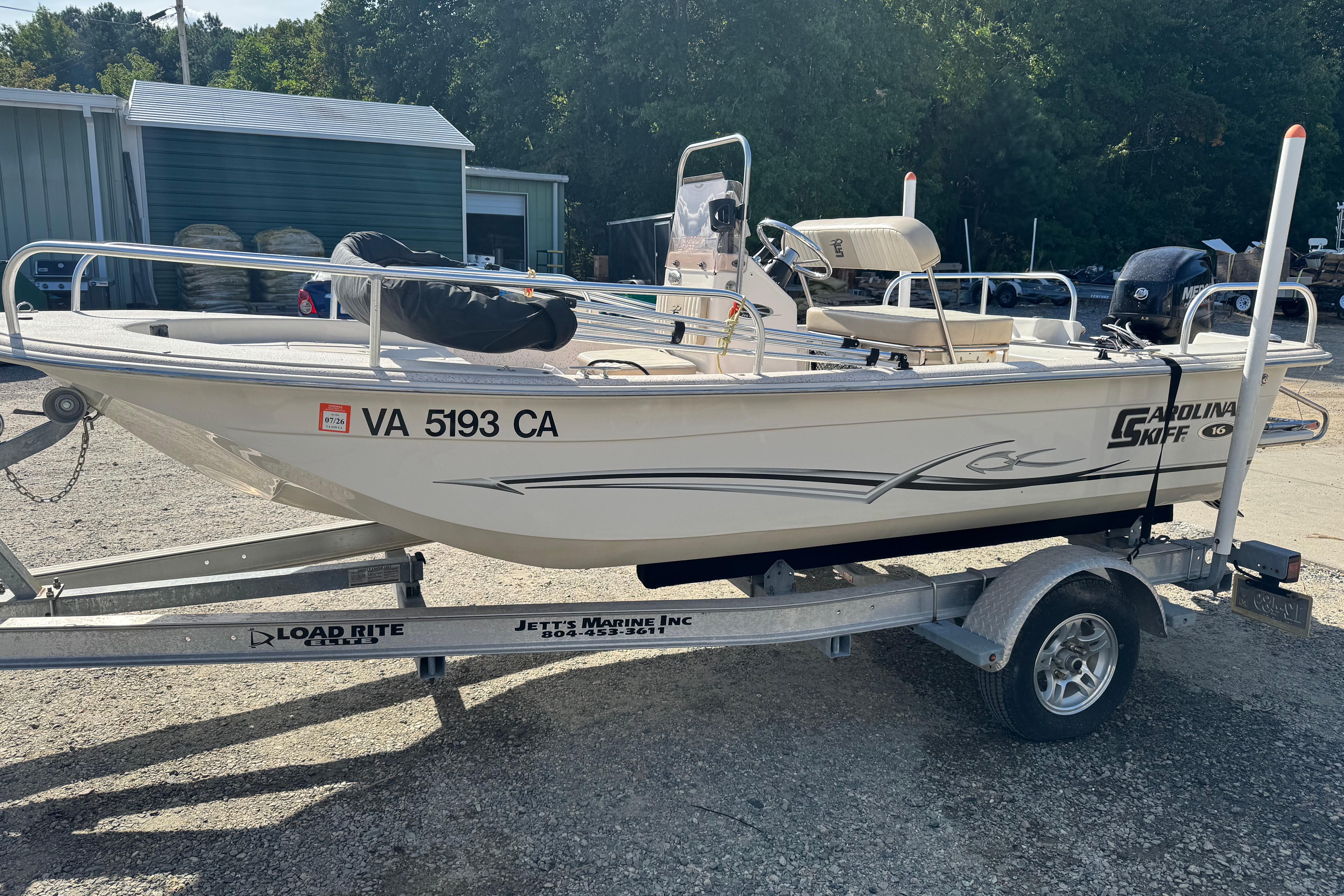 Carolina Skiff 16 JVX CC 2018 Carolina Skiff 16 JVX CC boat on trailer, parked outdoors.