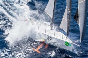 Custom Infiniti 46 Sailing yacht Infiniti 46 from 2015 navigating rough seas with splashing waves.