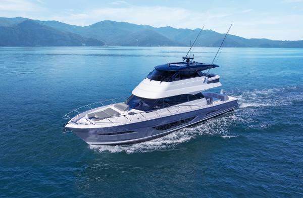 Maritimo M600 2026 Maritimo M600 yacht cruising on serene blue waters with mountainous backdrop.
