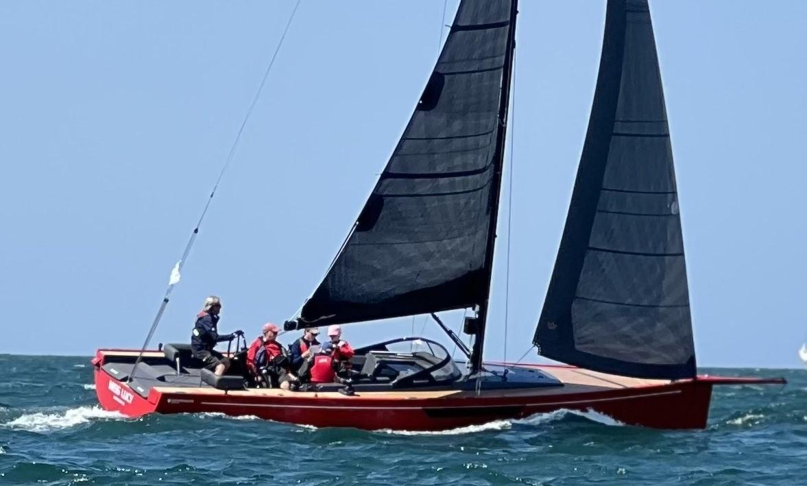 Saffier 33 Life 2023 Saffier 33 Life sailboat with black sails on open water.
