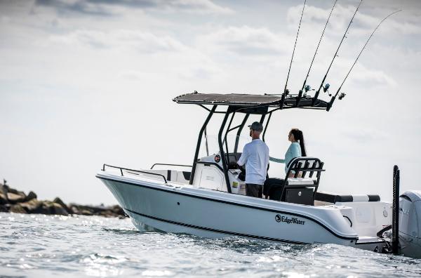 Edgewater 208CC Watchman 2025 Edgewater 208CC Watchman boat on water with two people fishing.