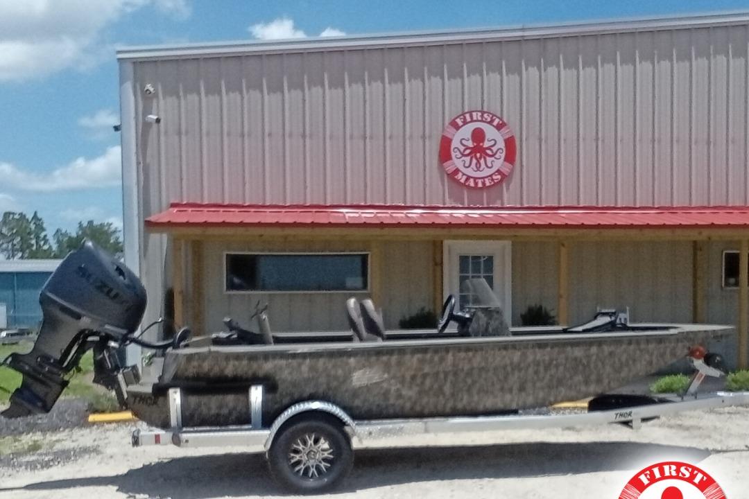 Thor 1900 Lake Hammer SC 2026 Thor 1900 Lake Hammer SC boat on trailer outside First Mates building.