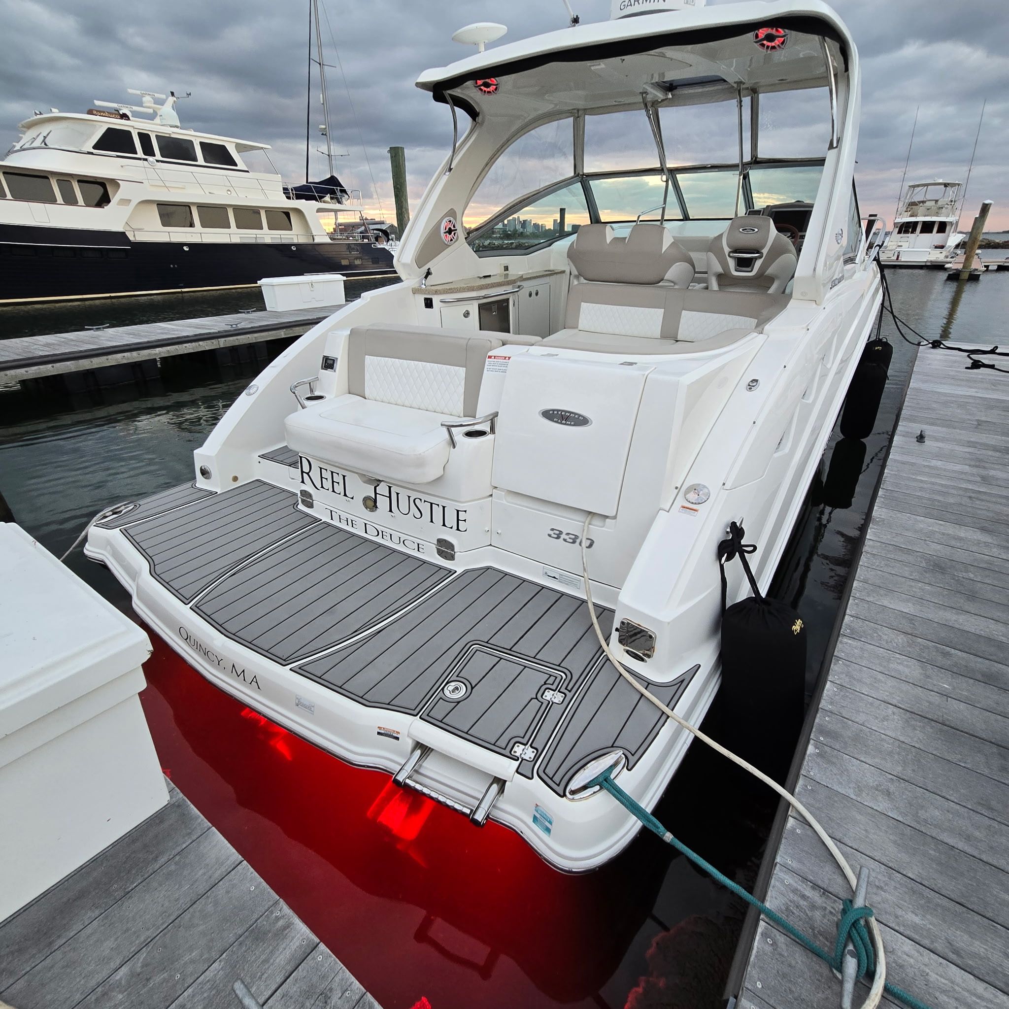 Chaparral 330 Signature 2011 Chaparral 330 Signature boat docked, featuring spacious deck and seating area.