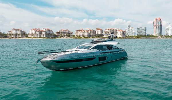 Azimut S8 2022 Azimut S8 yacht cruising near coastal city skyline.