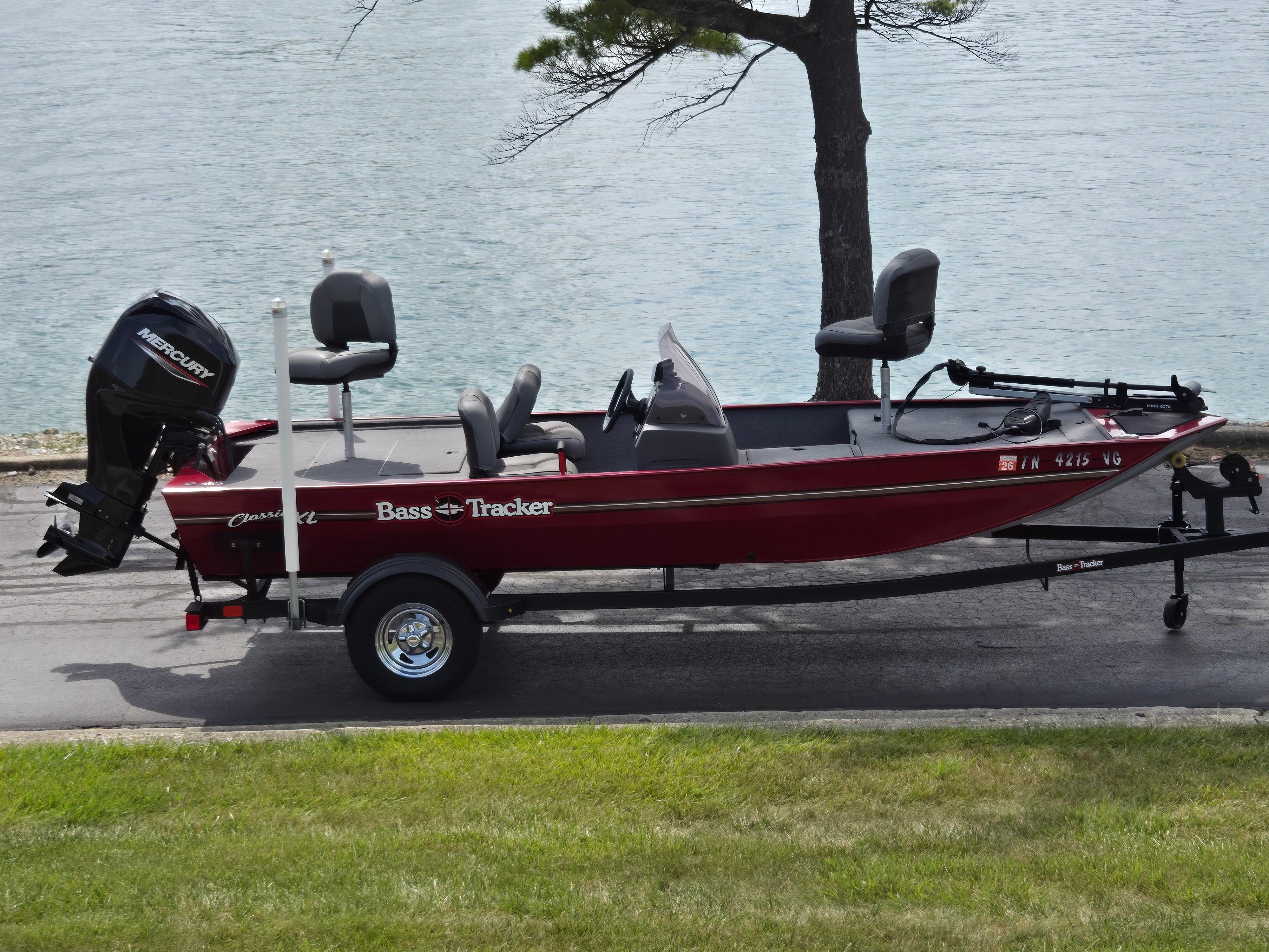 Tracker Bass Tracker Classic XL 2023 Tracker Bass Tracker Classic XL boat on trailer by a lake.