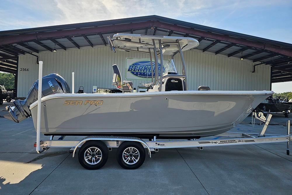 Sea Pro 222 Center Console 2025 Sea Pro 222 Center Console boat on trailer at dealership.