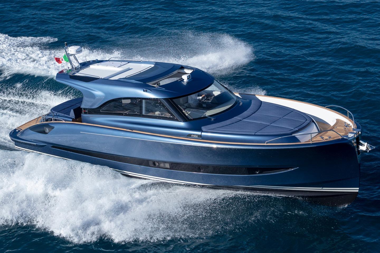 Solaris Power 48 Coupe 2026 Solaris Power 48 Coupe yacht cruising on open sea, showcasing sleek design and performance.