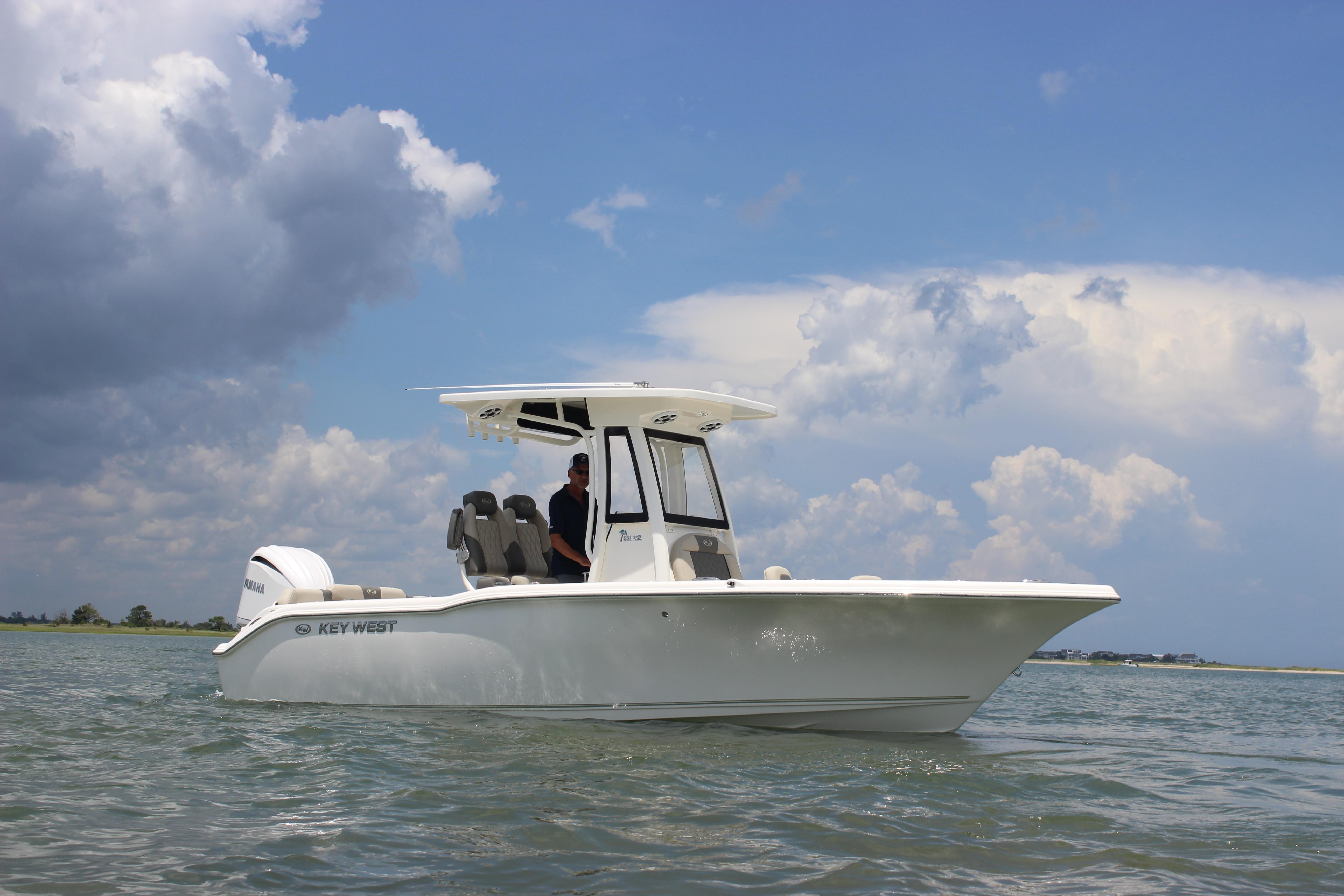 Key West 239 FS 2026 Key West 239 FS boat on water under cloudy sky.
