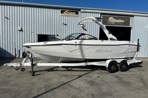 Malibu Wakesetter 23 LSV 2026 Malibu Wakesetter 23 LSV boat on trailer outside Malibu Boats facility.